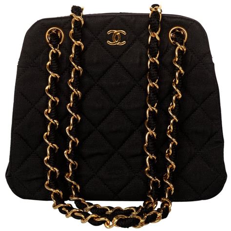 black chanel bag with black chain|small black quilted chanel bag.